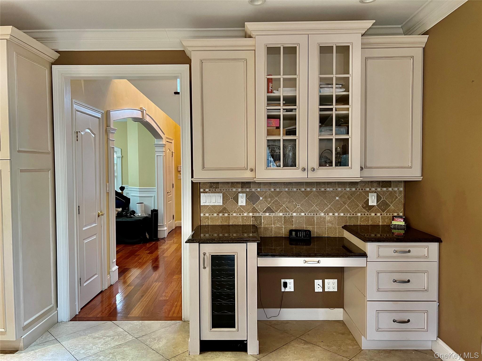 3683 Orchard Road Wantagh, NY 11793 - Photo 14 of 42 a kitchen with stainless steel appliances granite countertop a sink and cabinets with wooden floor
