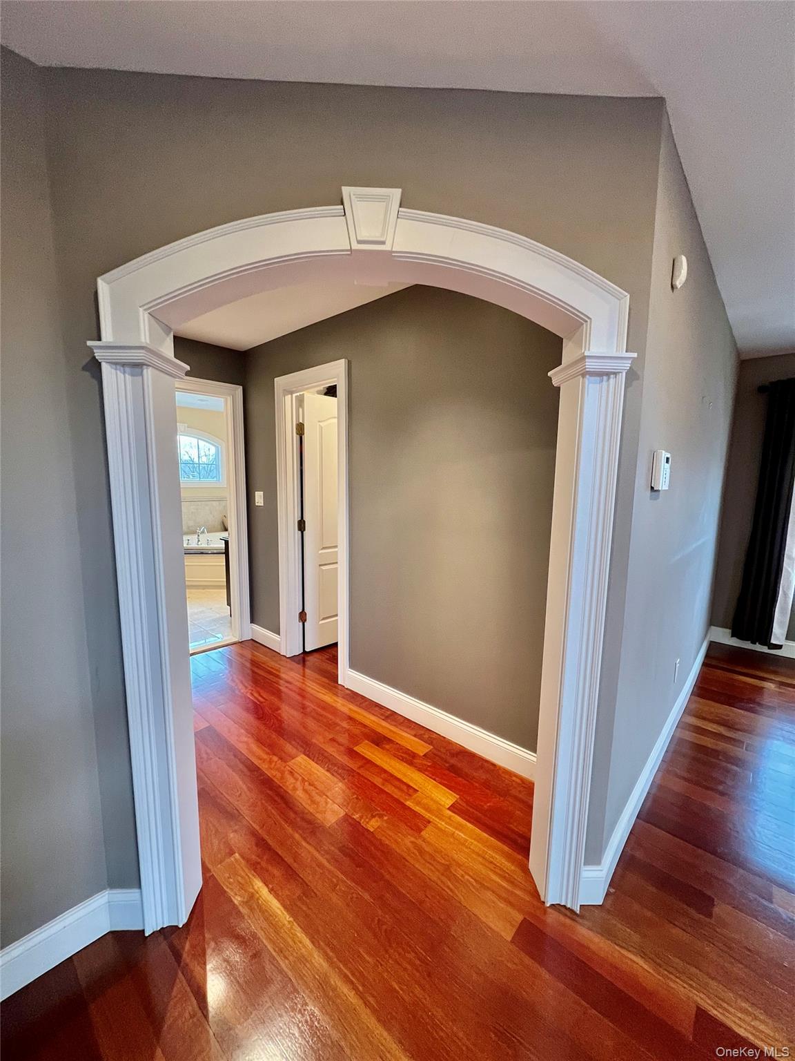 3683 Orchard Road Wantagh, NY 11793 - Photo 20 of 42 a view of an entryway with wooden floor