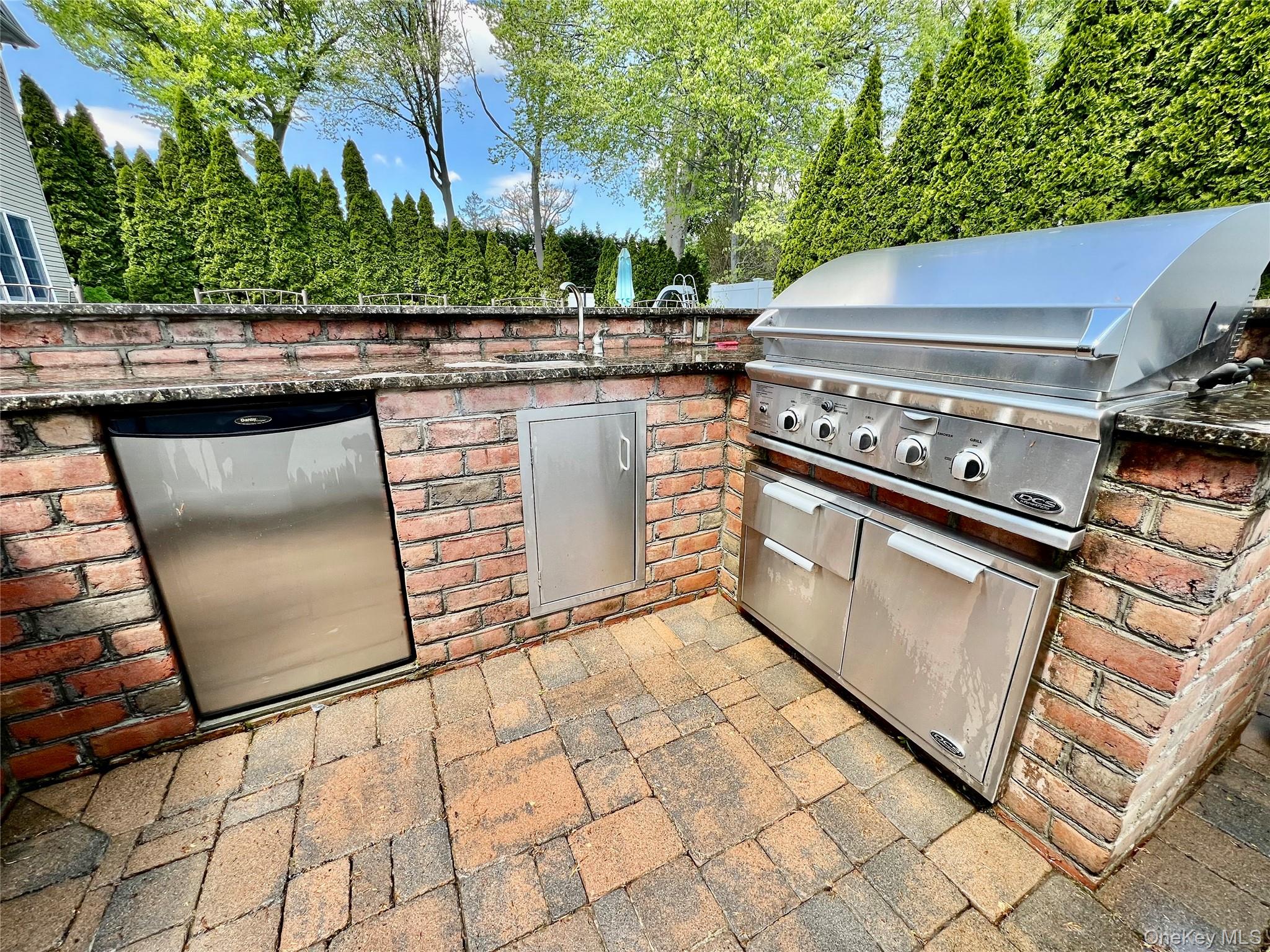 3683 Orchard Road Wantagh, NY 11793 - Photo 40 of 42 a stove top oven sitting inside of a kitchen
