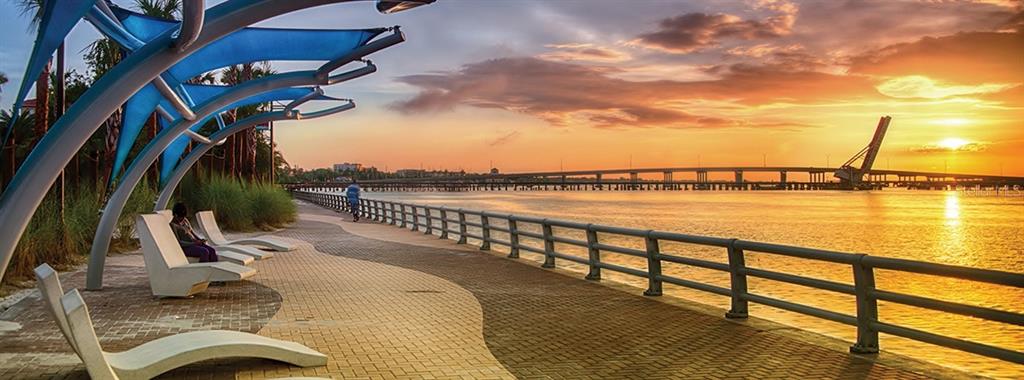 808 3rd Avenue West, Unit 701 Bradenton, FL 34205 - Photo 45 of 45 a view of a swimming pool with a lounge chair