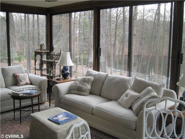 2841 West Brigstock Road Midlothian, VA 23113 - Photo 5 of 11 a living room with furniture and a large window