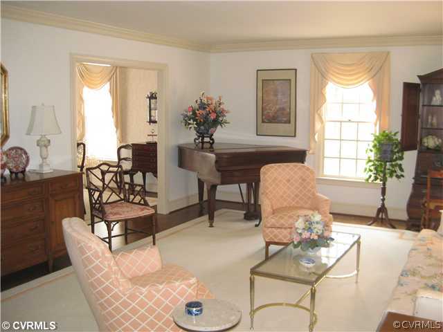 2841 West Brigstock Road Midlothian, VA 23113 - Photo 10 of 11 a living room with furniture and a potted plant