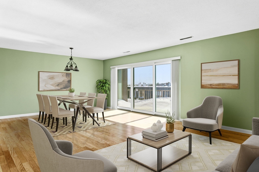 a living room with furniture and a table