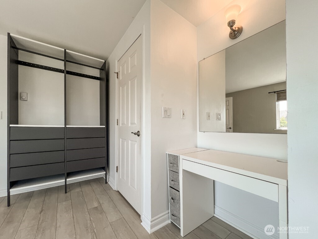 633 Northwest 85th Street, Unit 301 Seattle, WA 98117 - Photo 15 of 34 a bathroom with a shower and a sink