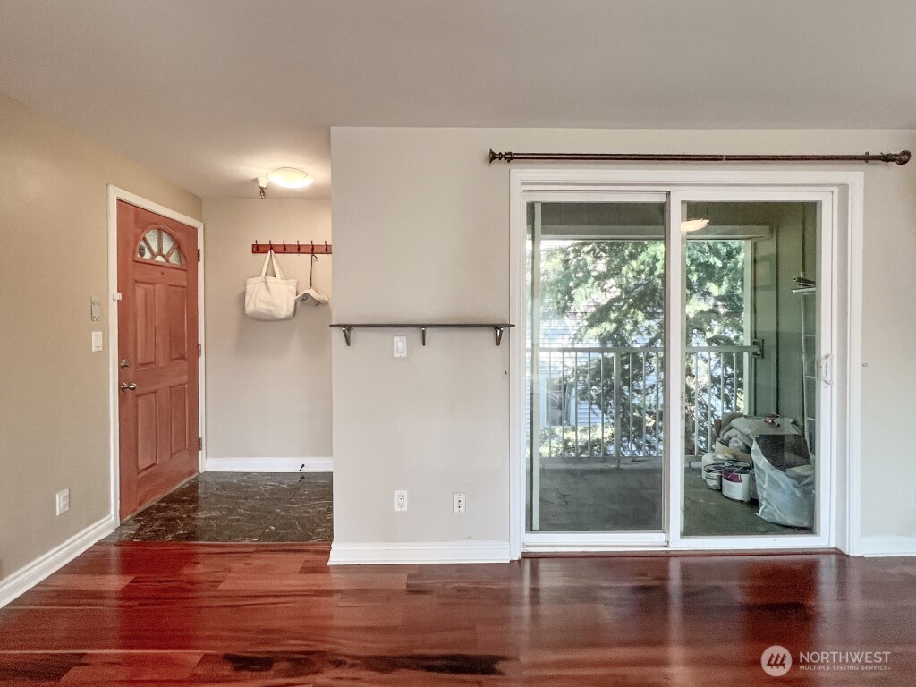 633 Northwest 85th Street, Unit 301 Seattle, WA 98117 - Photo 26 of 34 a view of interior space with wooden floor and window