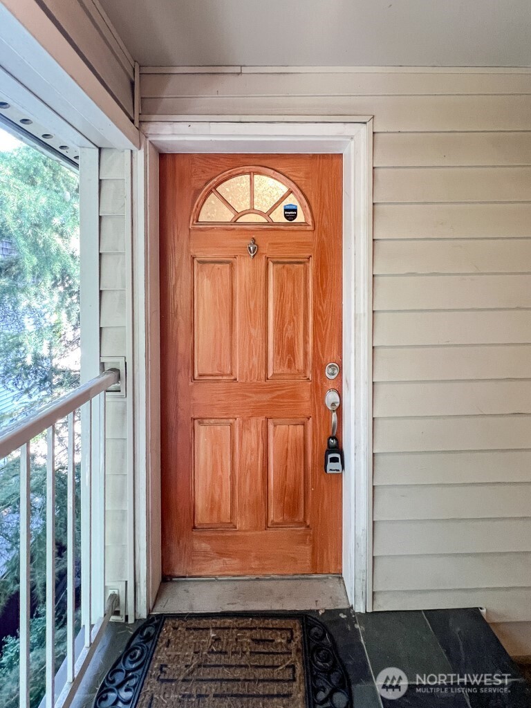 633 Northwest 85th Street, Unit 301 Seattle, WA 98117 - Photo 27 of 34 a view of front door with a door