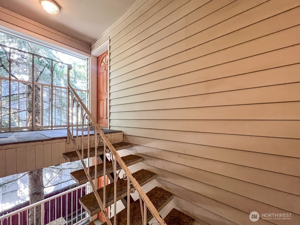 633 Northwest 85th Street, Unit 301 Seattle, WA 98117 - Photo 29 of 34 a view of entryway with wooden floor