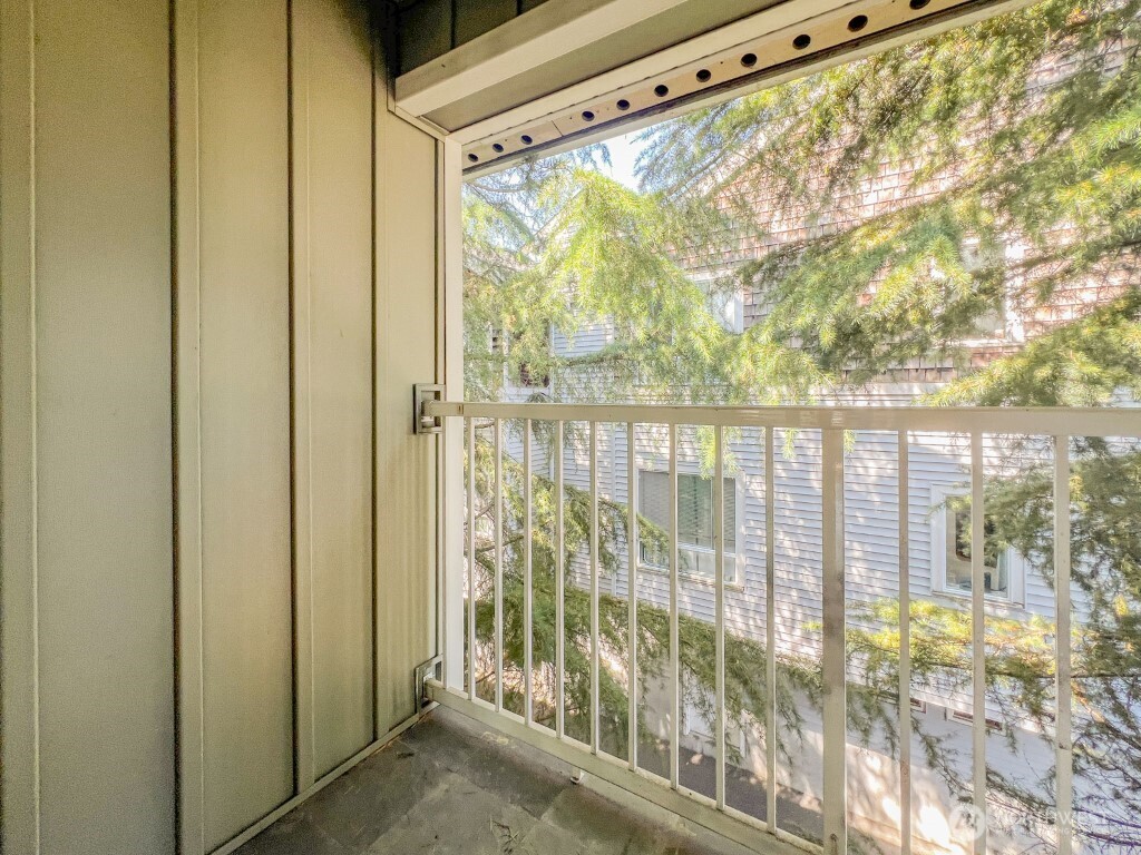 633 Northwest 85th Street, Unit 301 Seattle, WA 98117 - Photo 6 of 34 a view of a porch with a door and outside view
