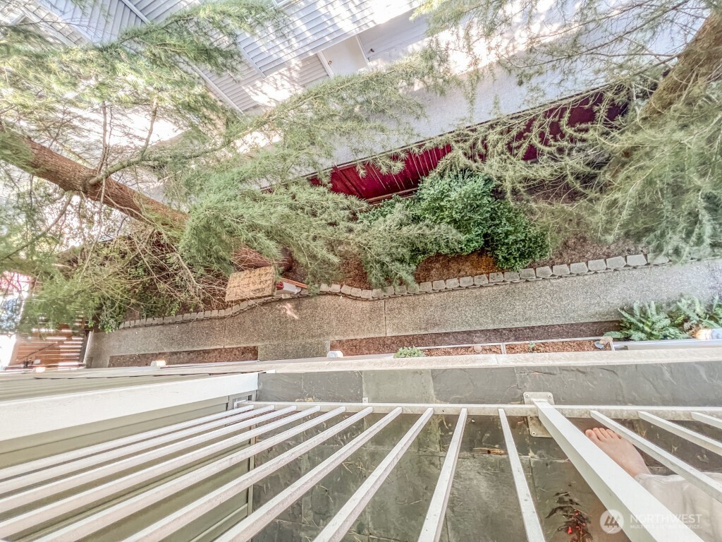 633 Northwest 85th Street, Unit 301 Seattle, WA 98117 - Photo 7 of 34 a view of a white building