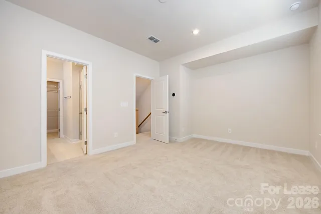 an empty room with a bathroom