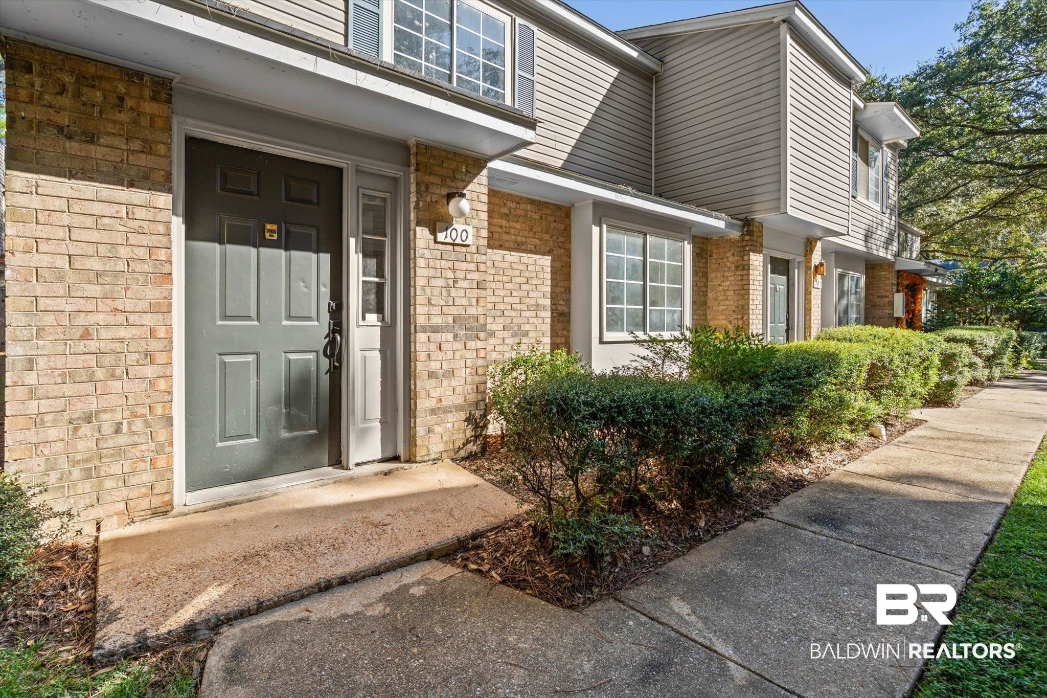 6701 Dickens Ferry Road, Unit 100 Mobile, AL 36608 - Photo 19 of 24 View of exterior entry with brick siding