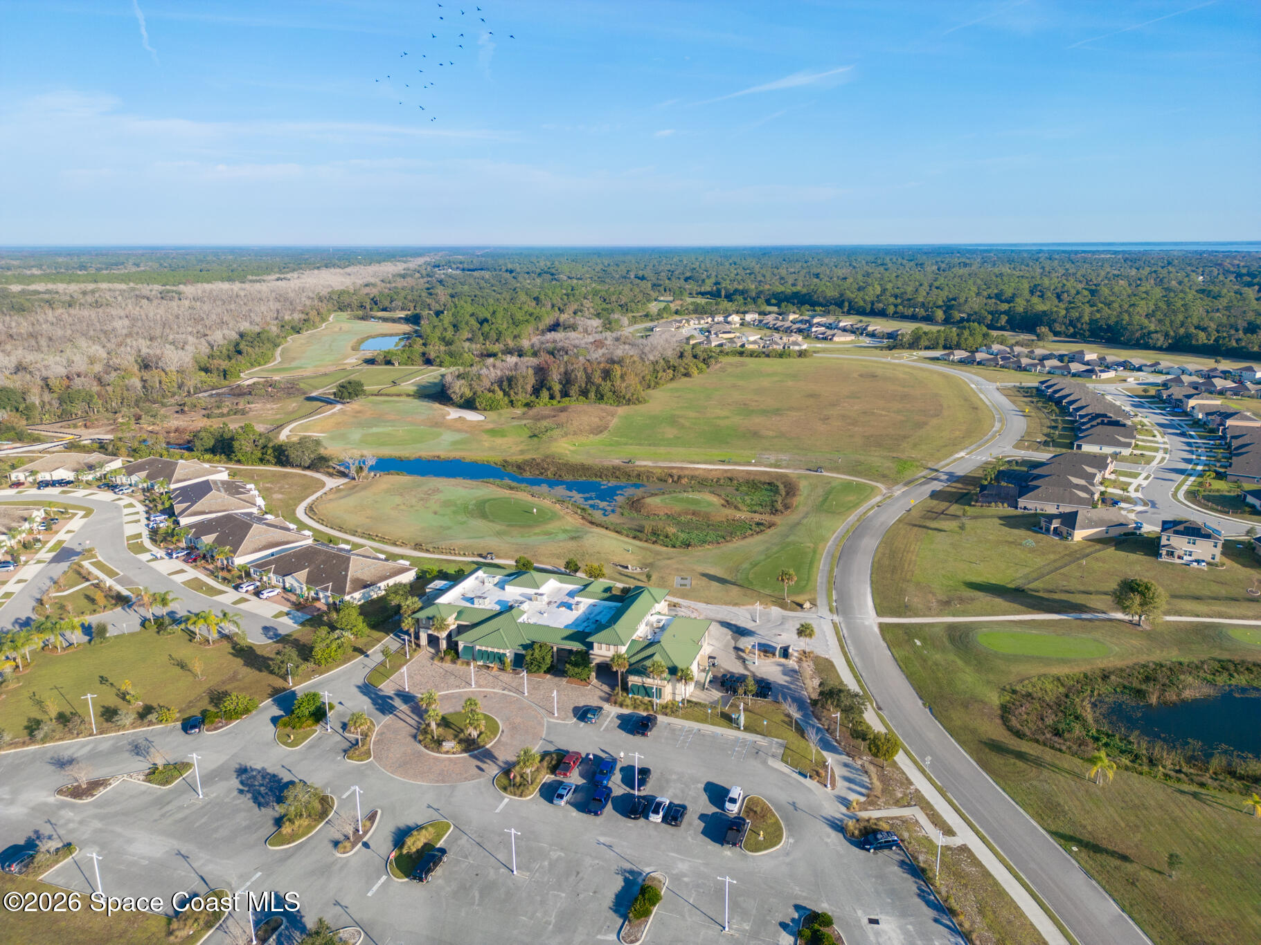 3210 Quantum Place Mims, FL 32754 - Photo 12 of 13 an aerial view of a city