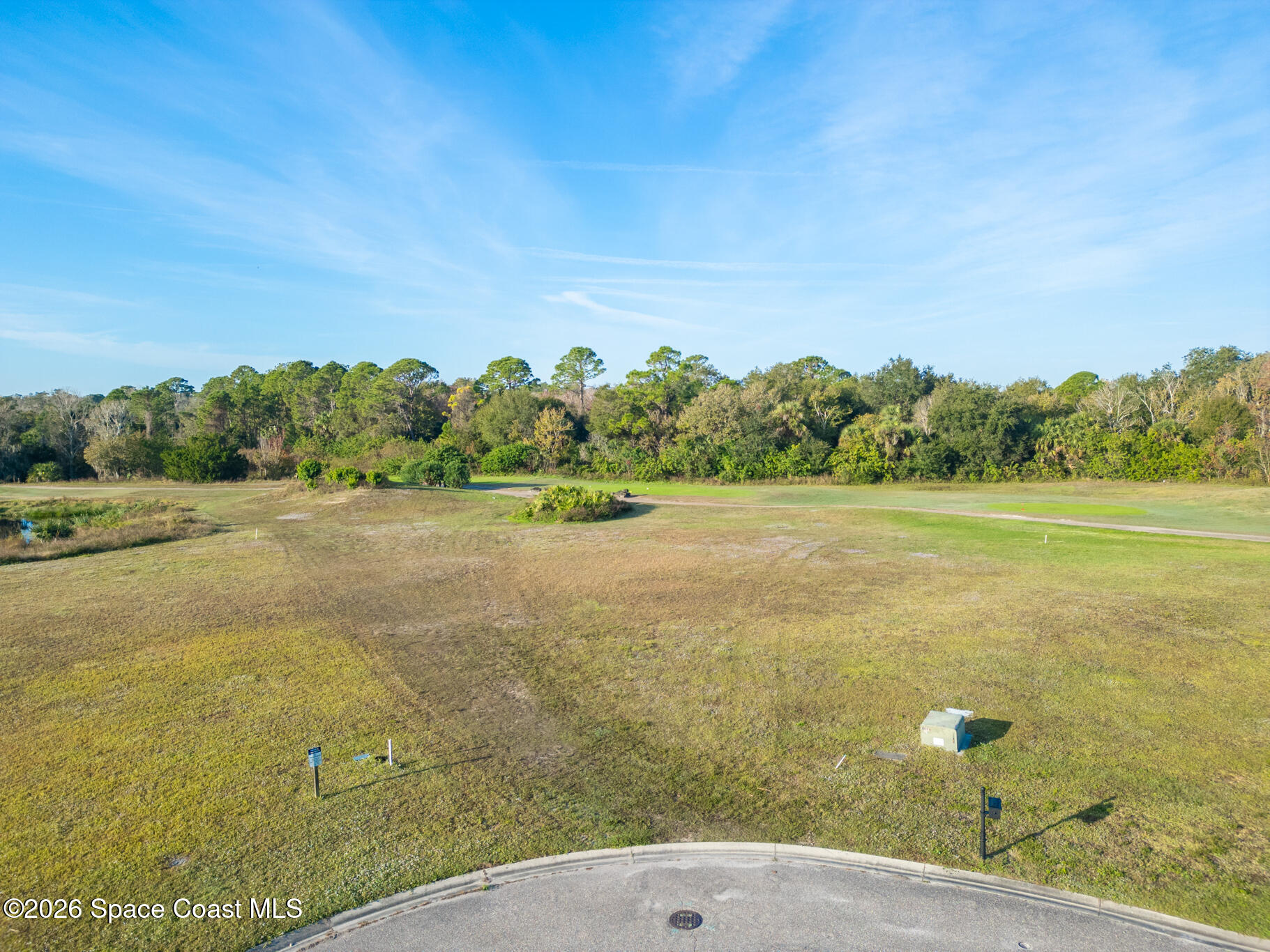 3210 Quantum Place Mims, FL 32754 - Photo 5 of 13 a view of a field with an ocean view