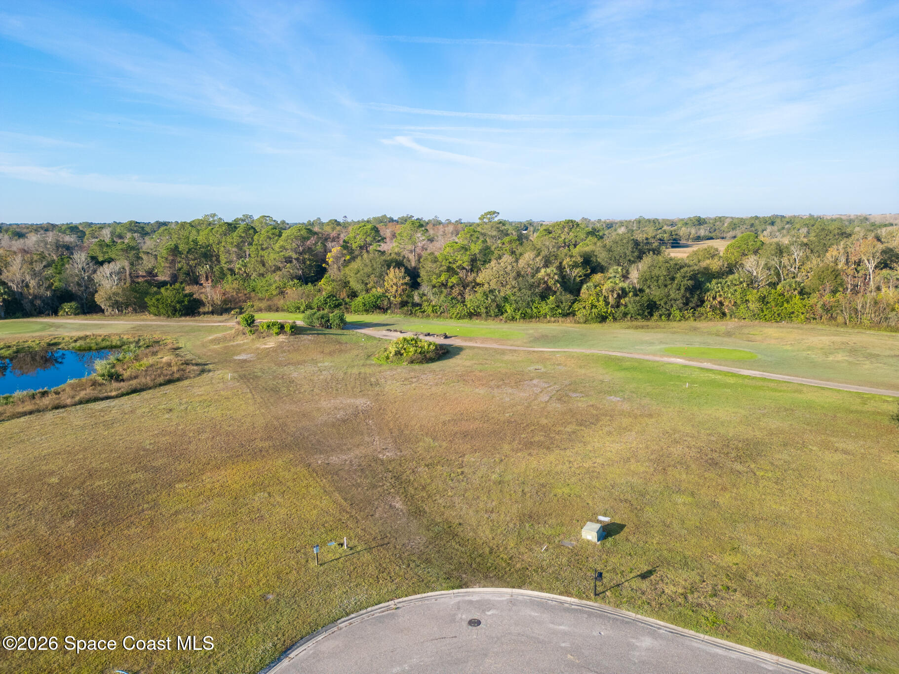 3210 Quantum Place Mims, FL 32754 - Photo 6 of 13 a view of a big yard with an outdoor space