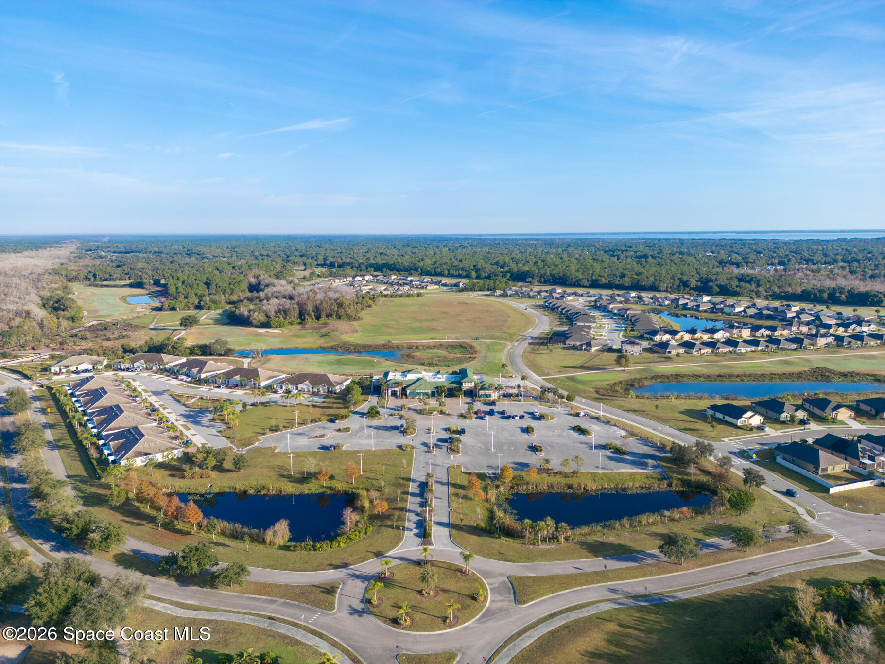 3210 Quantum Place Mims, FL 32754 - Photo 10 of 13 a view of a city with an ocean view