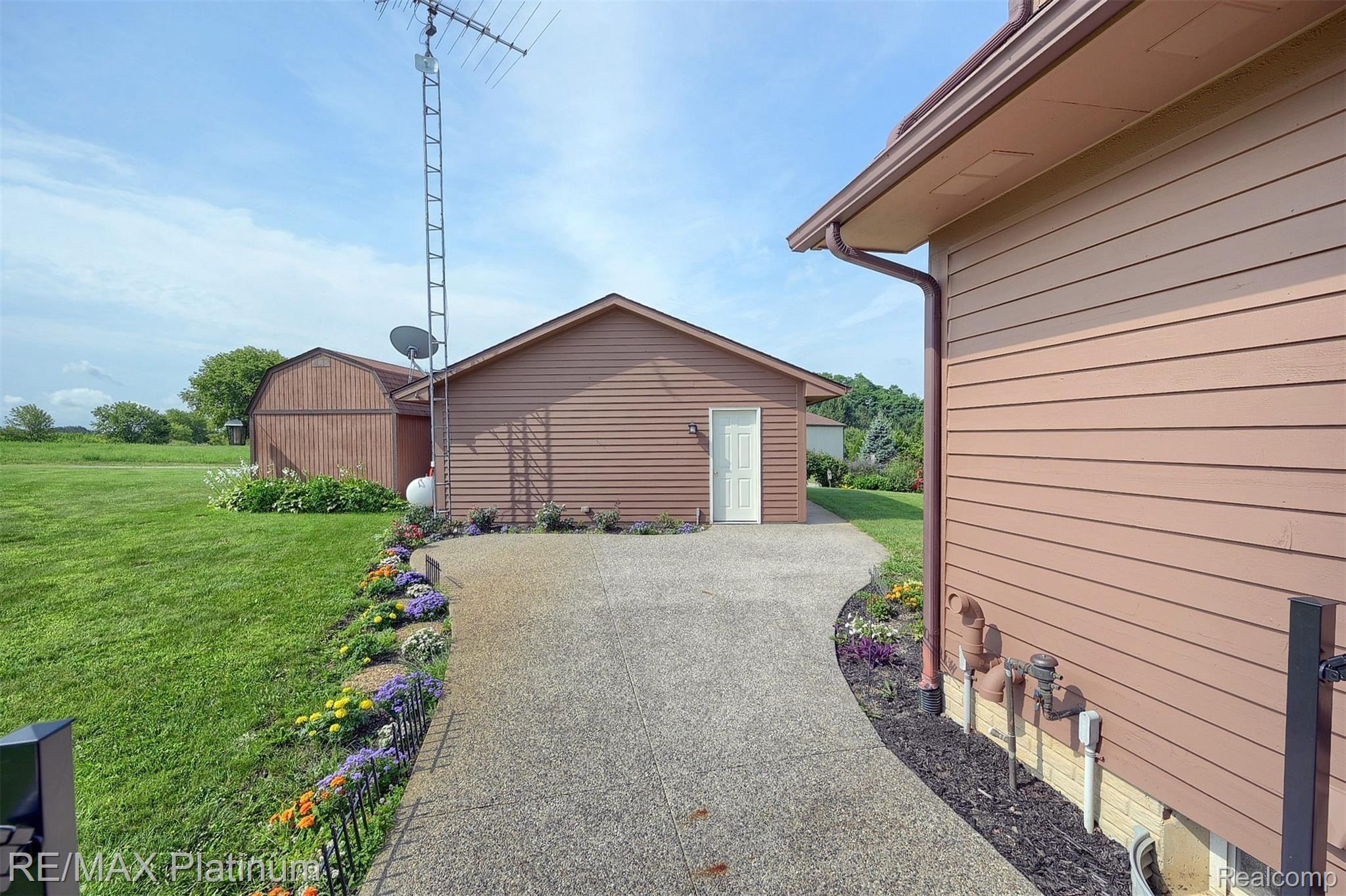 8090 Beard Road Byron, MI 48418 - Photo 34 of 43 34-Backyard.jpg