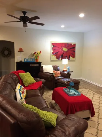 a bedroom with furniture and a bed