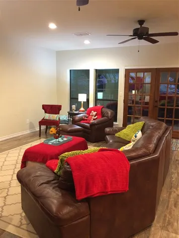 a bedroom with a bed and a lamp