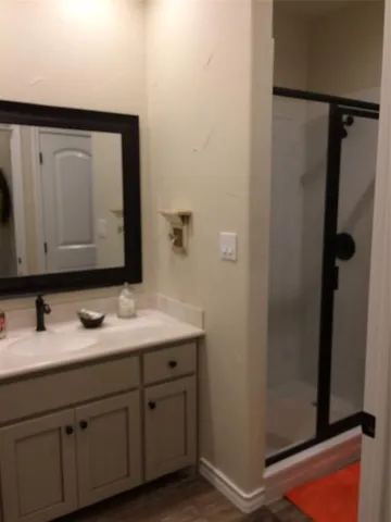 a kitchen with stainless steel appliances granite countertop a refrigerator stove top oven a sink and dishwasher