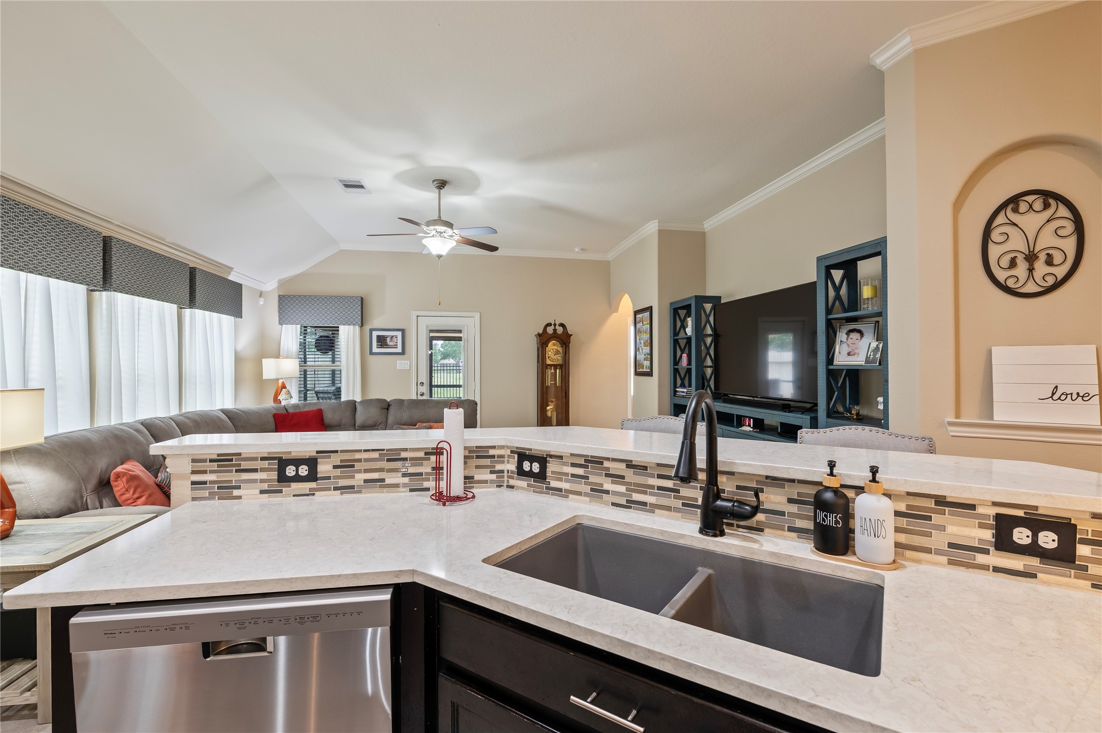 6822 Persea Ridge Lane Dickinson, TX 77539 - Photo 12 of 37 Kitchan looking into the Family Roon also showing Bar Seating Countertop