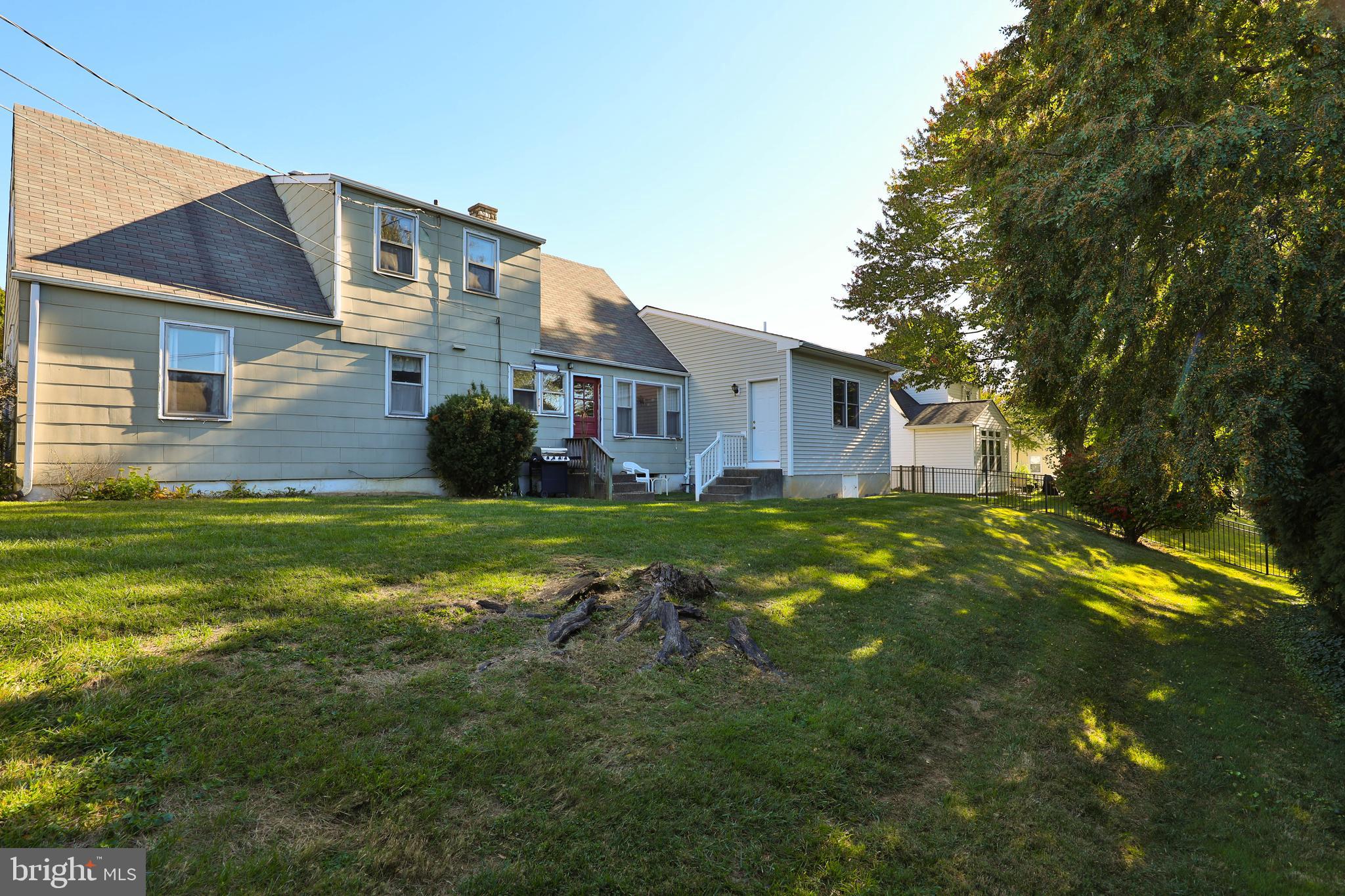 85 Manor Place Oreland, PA 19075 - Photo 22 of 22 a view of a house with a big yard