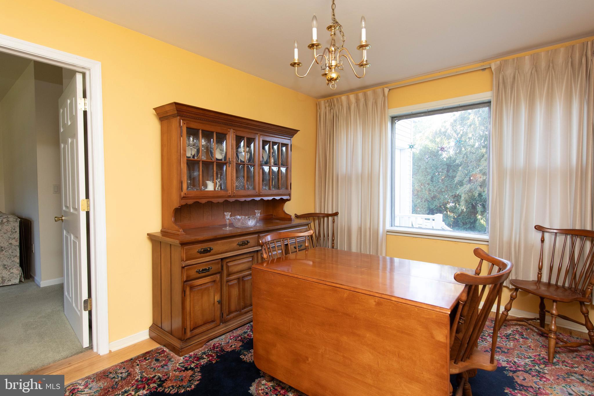 85 Manor Place Oreland, PA 19075 - Photo 6 of 22 a view of a dining room with furniture window and outside view