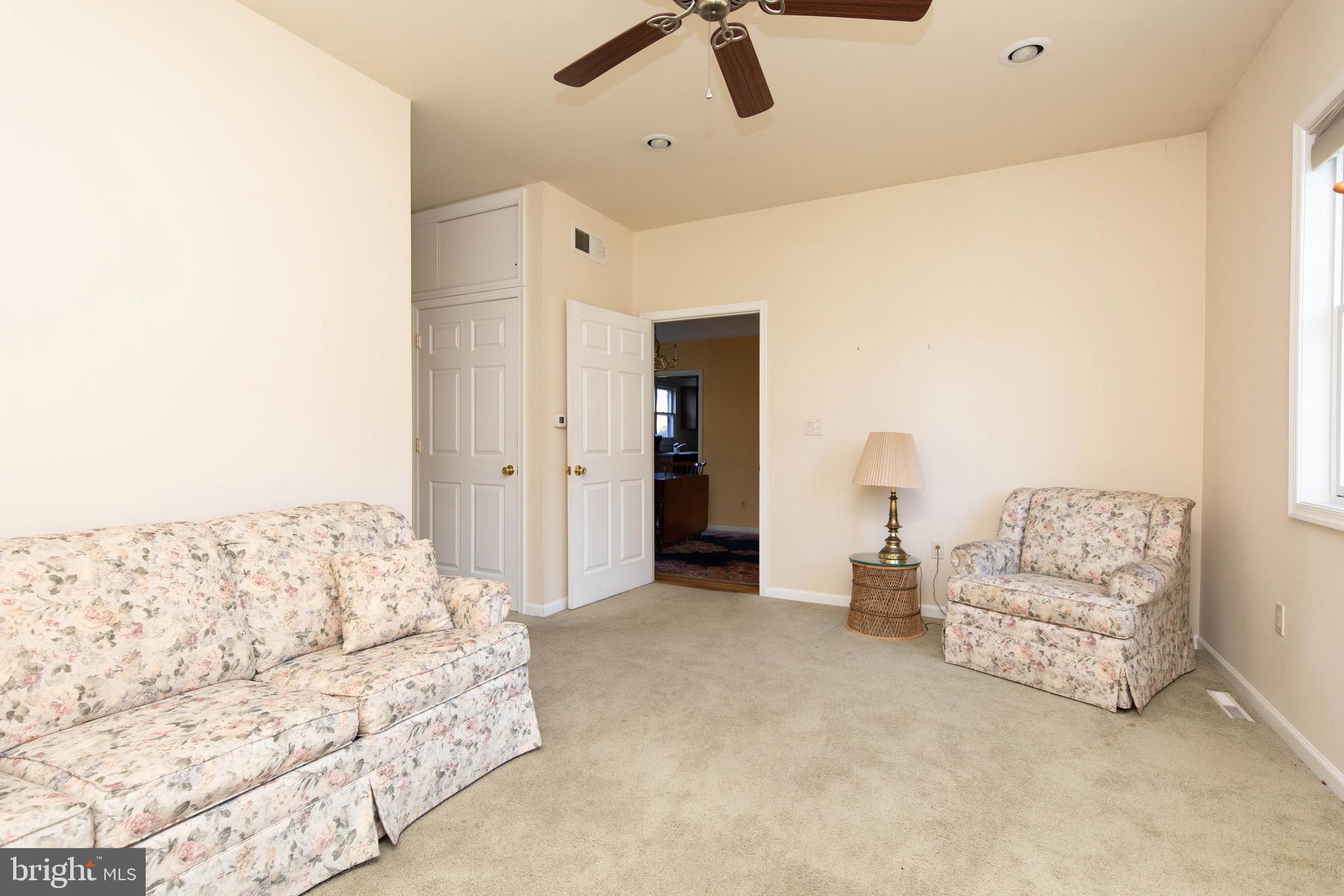 85 Manor Place Oreland, PA 19075 - Photo 9 of 22 a bedroom with furniture and white walls