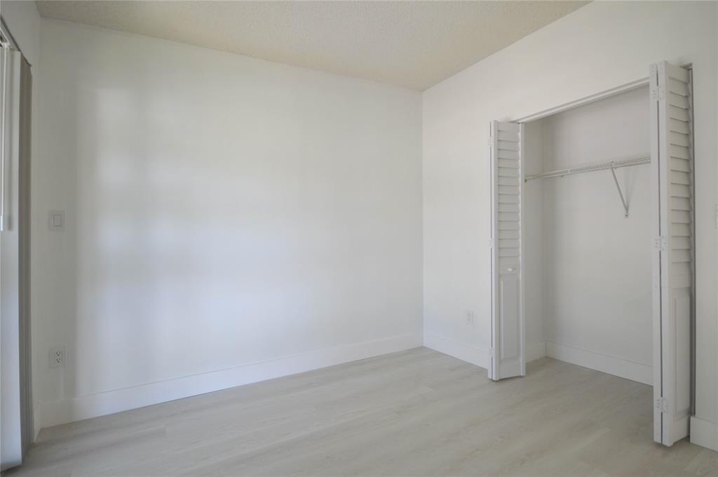 9499 West McNab Road, Unit 208 Tamarac, FL 33321 - Photo 9 of 12 a view of an empty room