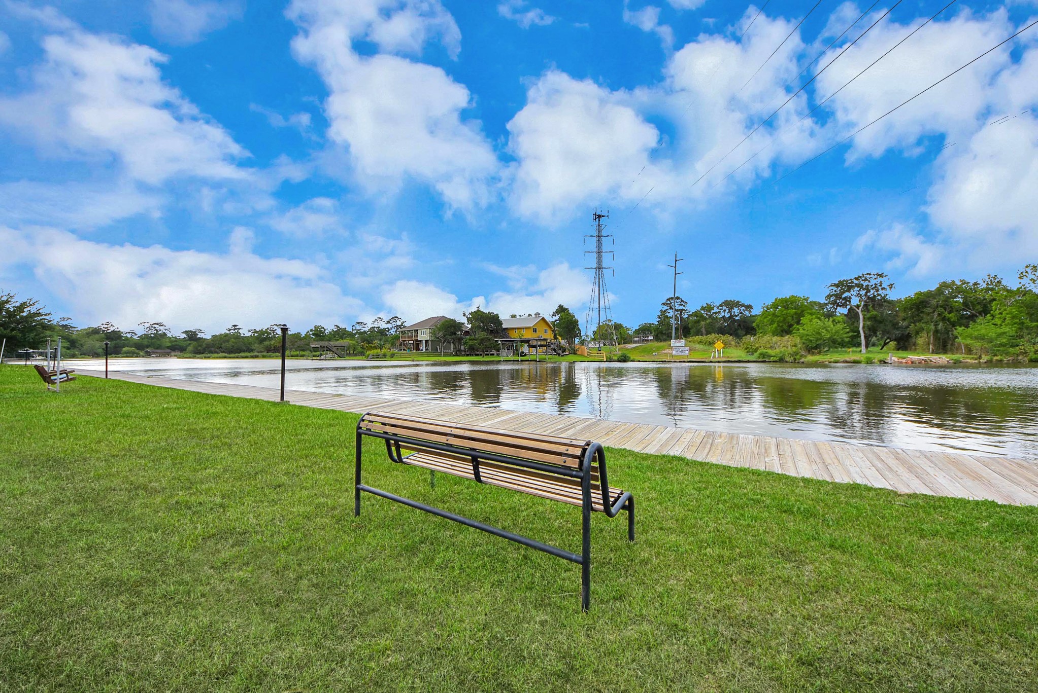 2117 Casa Rio Circle Dickinson, TX 77539 - Photo 21 of 23 a view of a lake with houses in the background