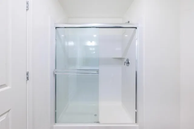 a kitchen with sink stove and refrigerator