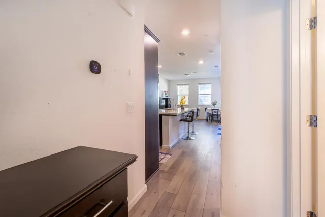 a front view of a building with a yard