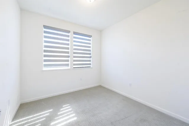 an aerial view of a city with lots of residential buildings