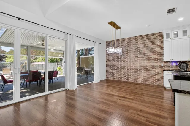 a utility room with sink dryer and washer