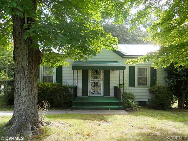 178 Buckner Road Bumpass, VA 23024 - Photo 1 of 16 a view of a house with backyard garden and a tree