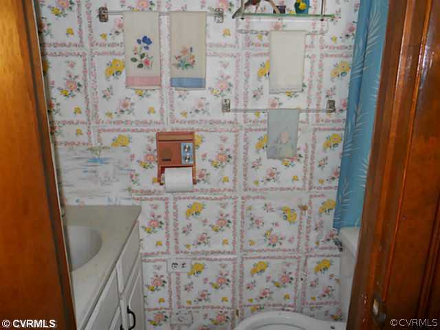 178 Buckner Road Bumpass, VA 23024 - Photo 12 of 16 a bathroom with a bathtub and shower