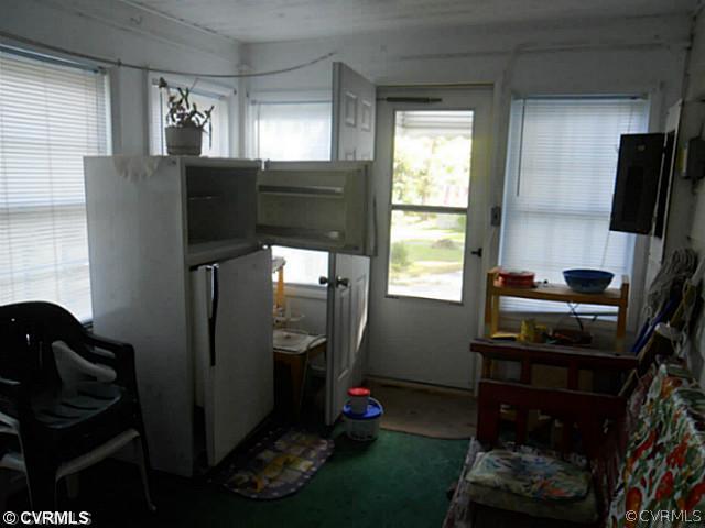 178 Buckner Road Bumpass, VA 23024 - Photo 6 of 16 a living room with furniture and a window