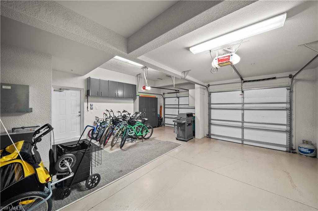 9220 Quartz Lane, Unit 202 Naples, FL 34120 - Photo 25 of 47 a view of a room with gym equipment