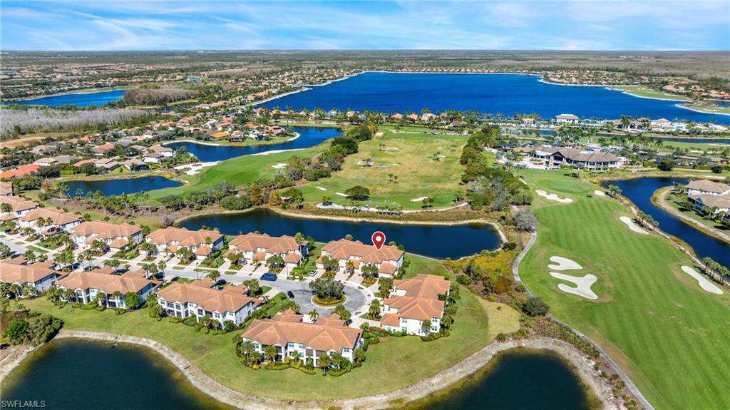 9220 Quartz Lane, Unit 202 Naples, FL 34120 - Photo 28 of 47 a view of a balcony with an ocean