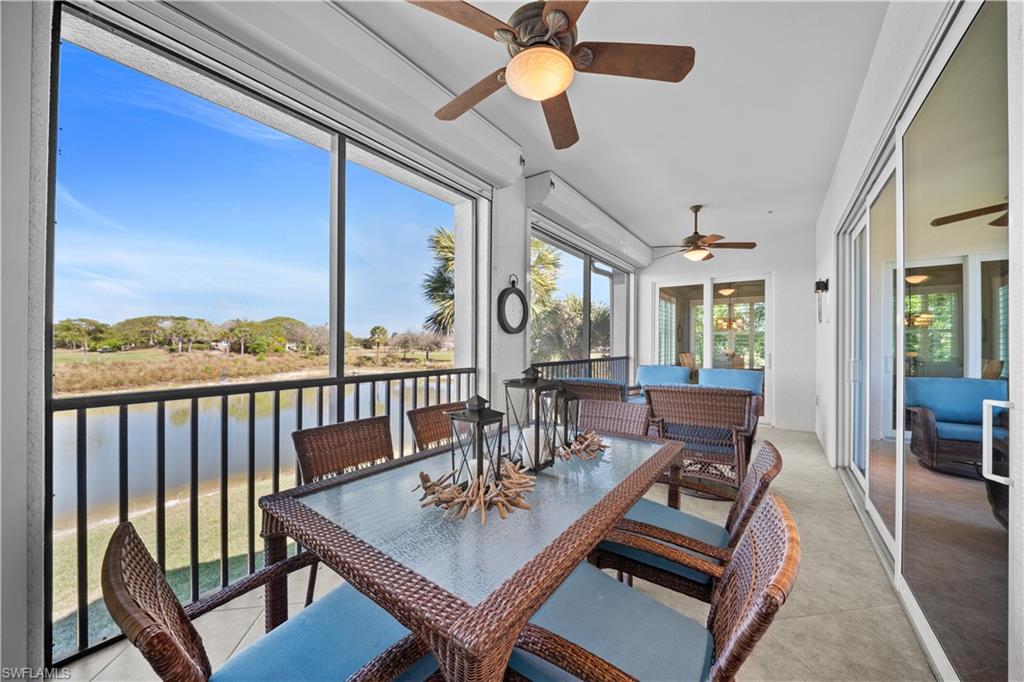 9220 Quartz Lane, Unit 202 Naples, FL 34120 - Photo 6 of 47 a view of a balcony dining area with furniture