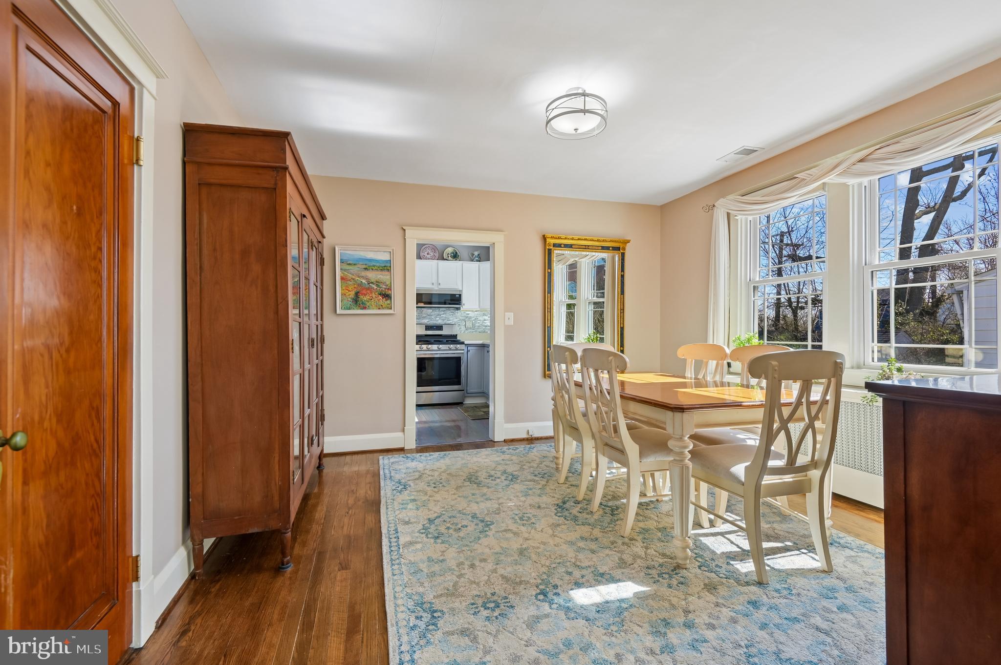 2724 Alden Road Parkville, MD 21234 - Photo 11 of 65 a dining room with furniture and wooden floor