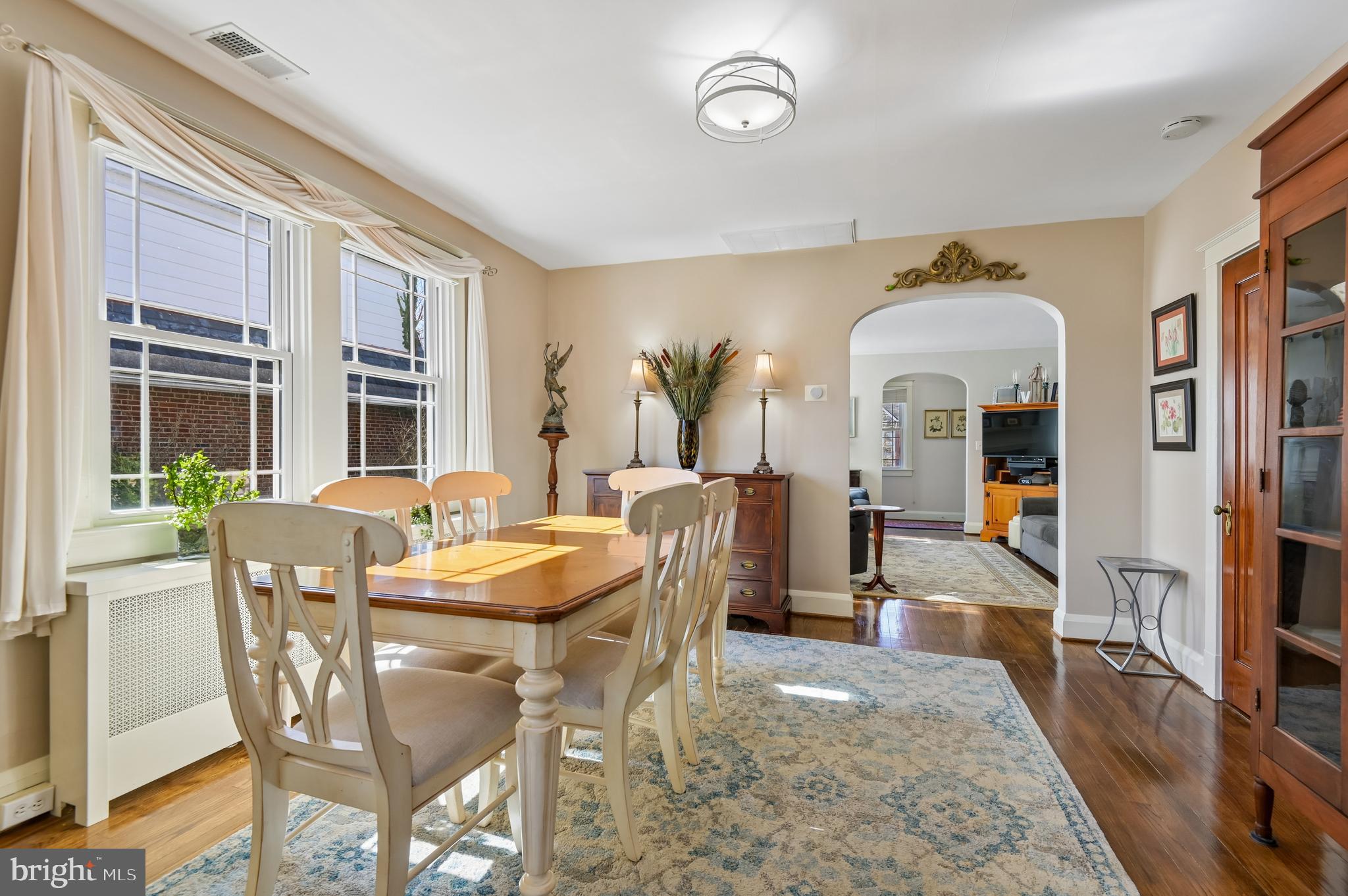 2724 Alden Road Parkville, MD 21234 - Photo 12 of 65 a view of a dining room with furniture window and wooden floor