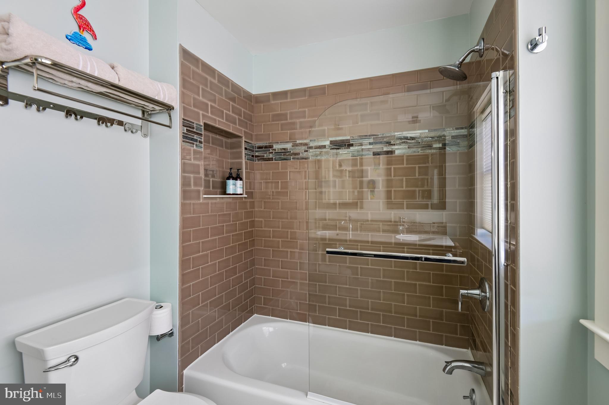 2724 Alden Road Parkville, MD 21234 - Photo 34 of 65 a bathroom with a bathtub and a shower