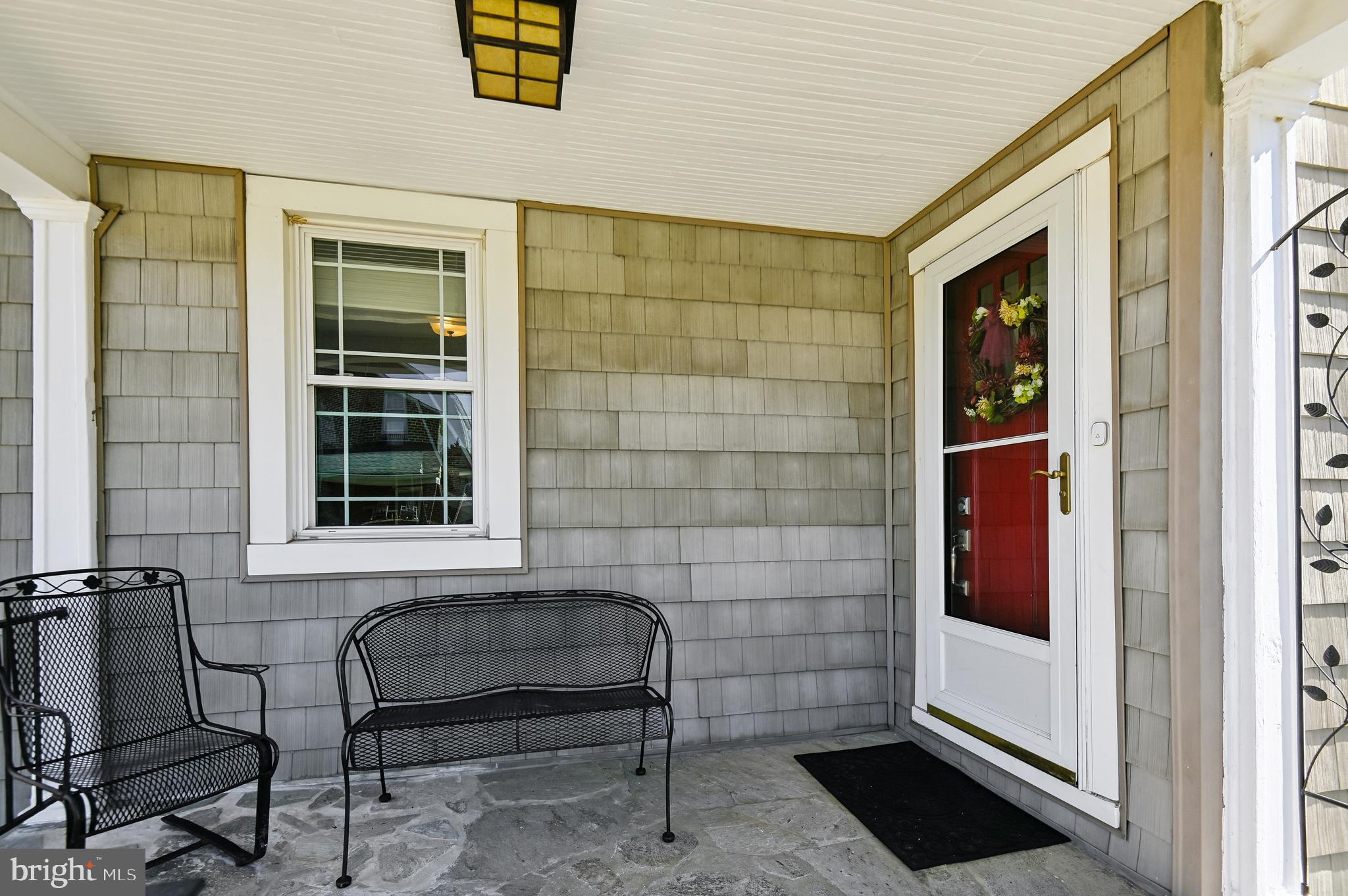 2724 Alden Road Parkville, MD 21234 - Photo 4 of 65 a view of a door and a chair in a room