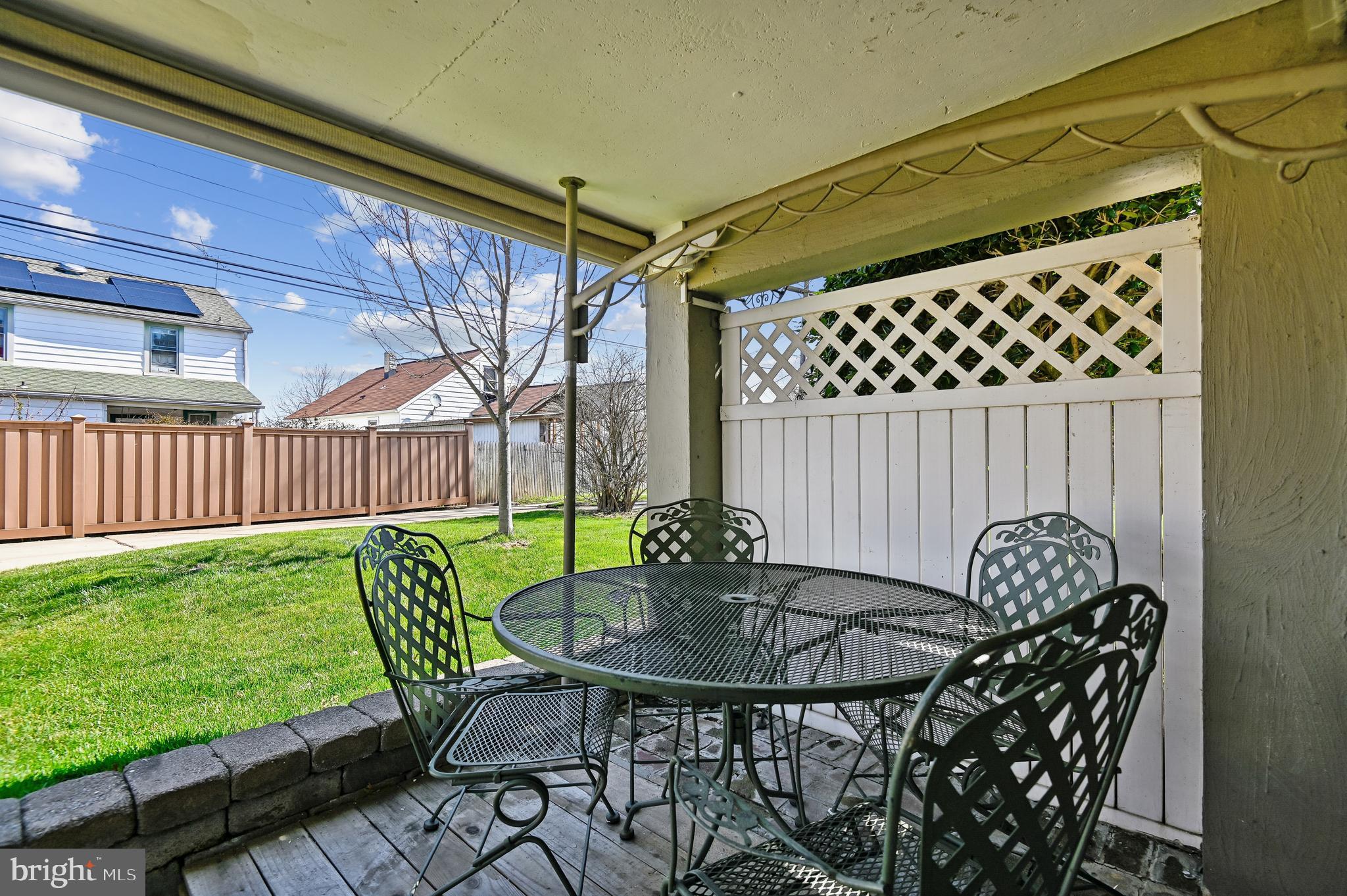 2724 Alden Road Parkville, MD 21234 - Photo 52 of 65 a table and chairs in patio of the house