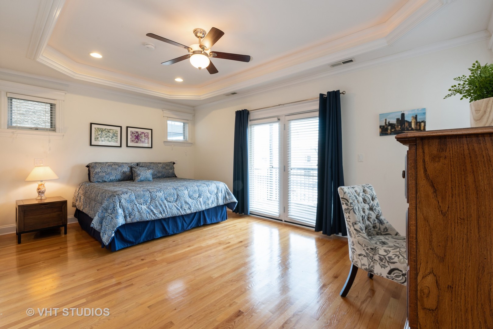 3535 North Reta Avenue, Unit 3 Chicago, IL 60657 - Photo 12 of 18 a bedroom with a bed and a chair