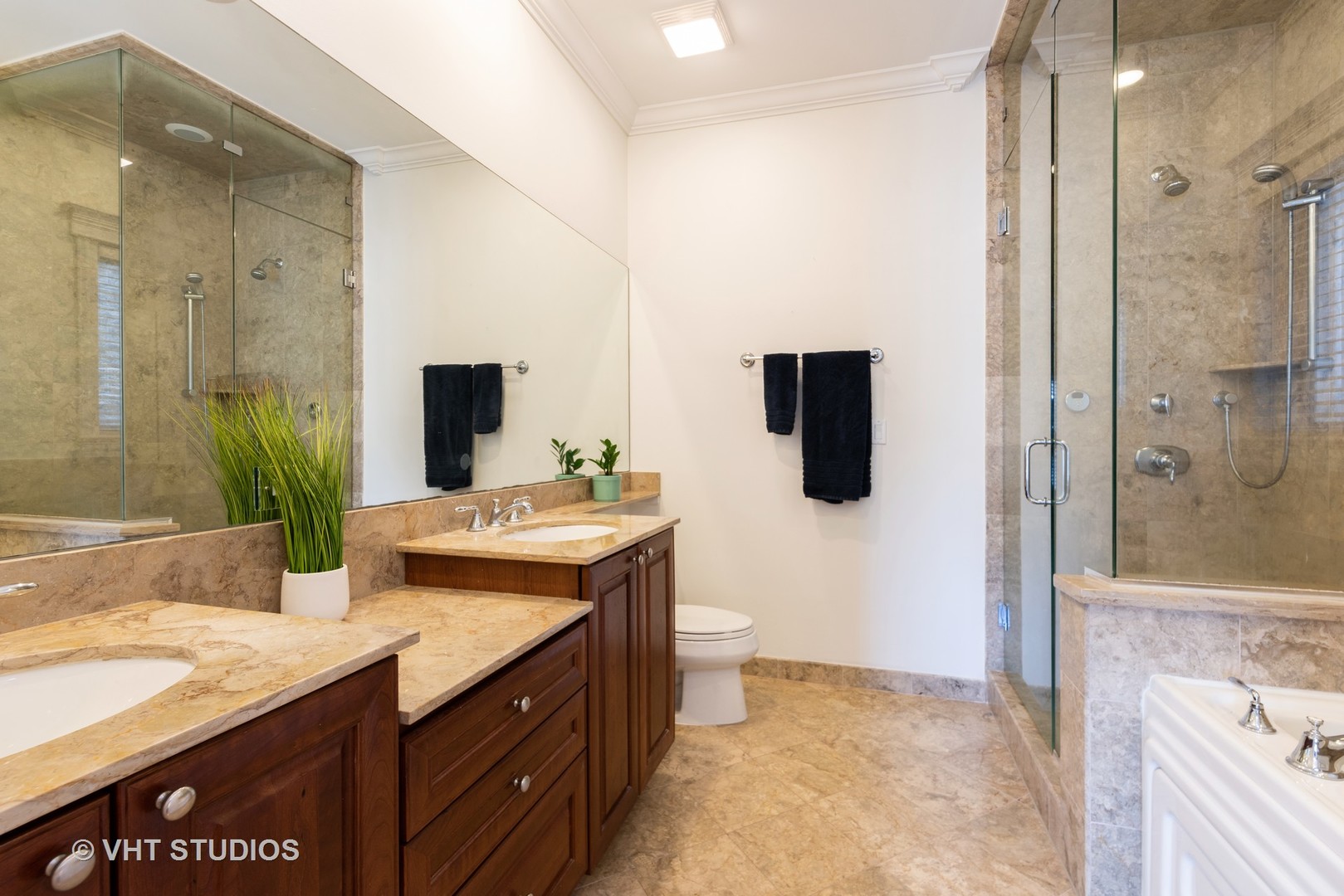 3535 North Reta Avenue, Unit 3 Chicago, IL 60657 - Photo 13 of 18 a bathroom with a granite countertop sink a mirror and shower