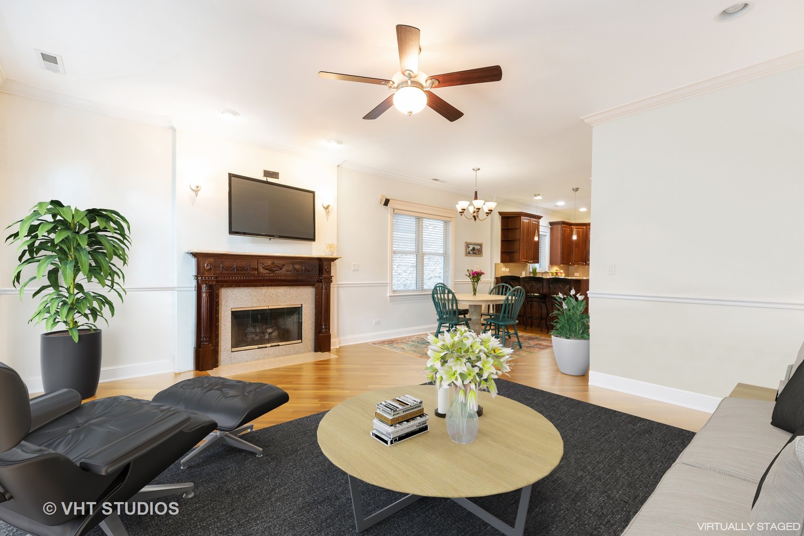 3535 North Reta Avenue, Unit 3 Chicago, IL 60657 - Photo 3 of 18 a living room with furniture fireplace and a flat screen tv