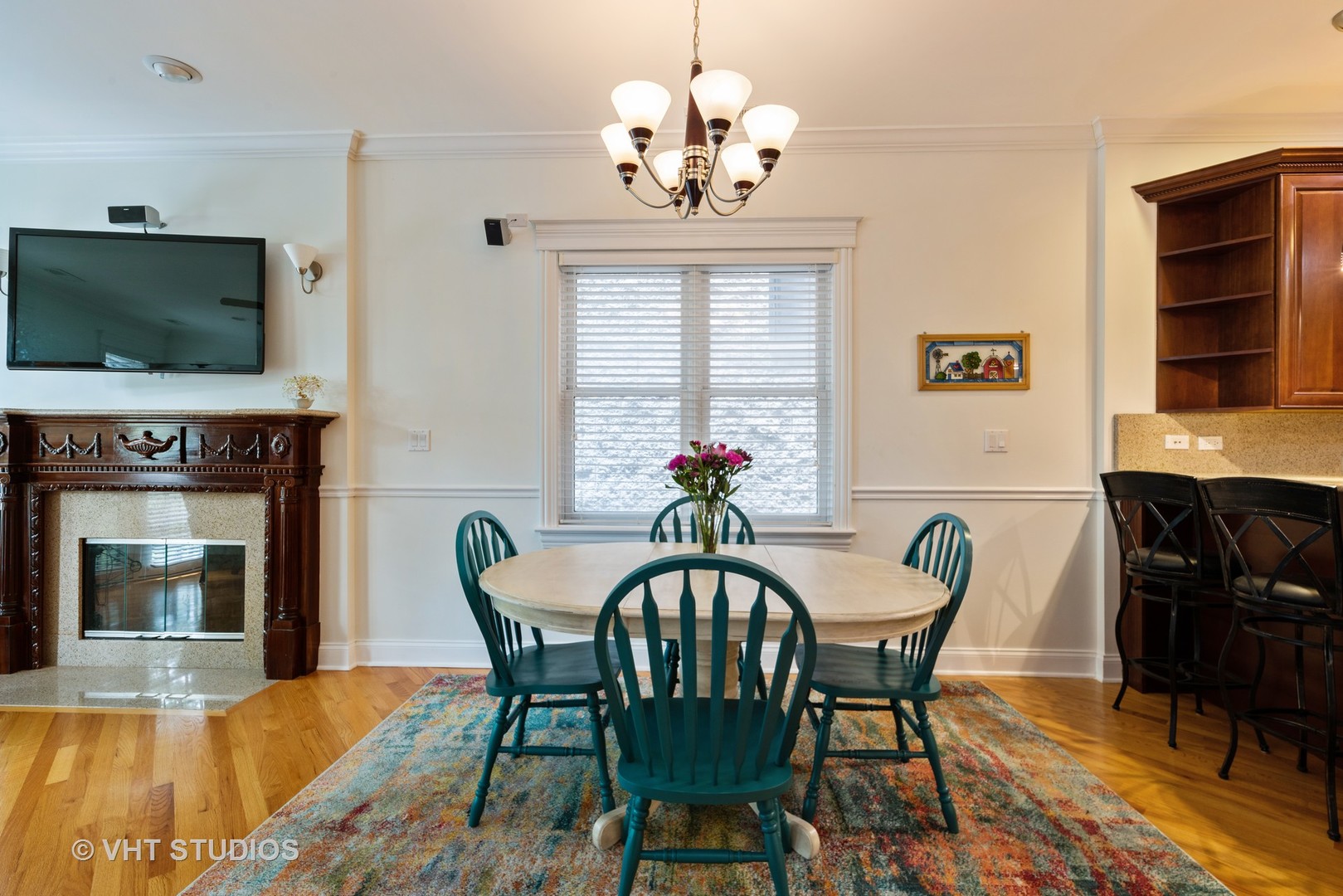3535 North Reta Avenue, Unit 3 Chicago, IL 60657 - Photo 6 of 18 a view of a dining room with furniture window and wooden floor