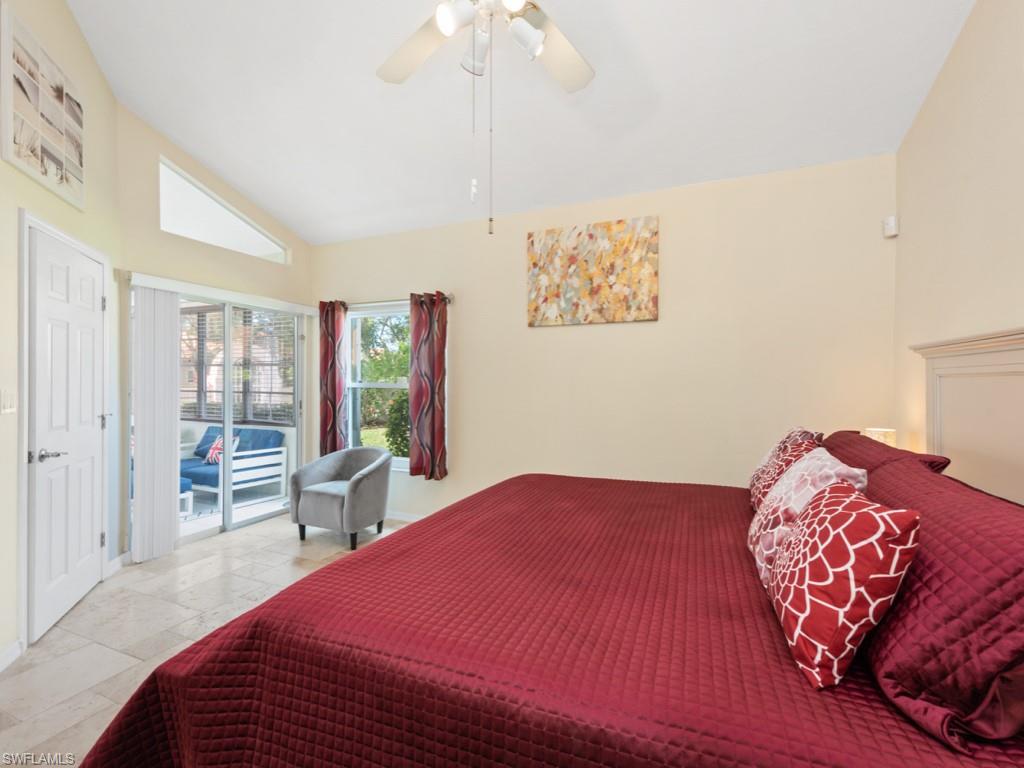 181 Napa Ridge Road East, Unit 35 Naples, FL 34119 - Photo 8 of 17 a bedroom with a large bed and a window