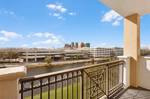 a view of a balcony with city view